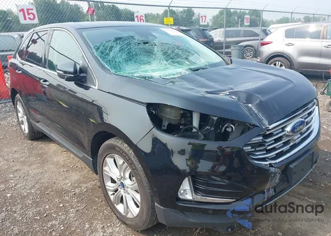 2022 Ford Edge Titanium z USA, uszkodzony, nr VIN 2FMPK4K90NBA39071